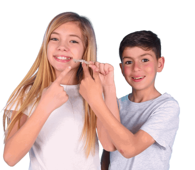 Young girl and boy with clear orthodontic aligners smiling.