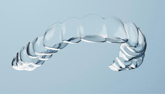 Transparent clear aligner for teeth straightening and orthodontic correction.