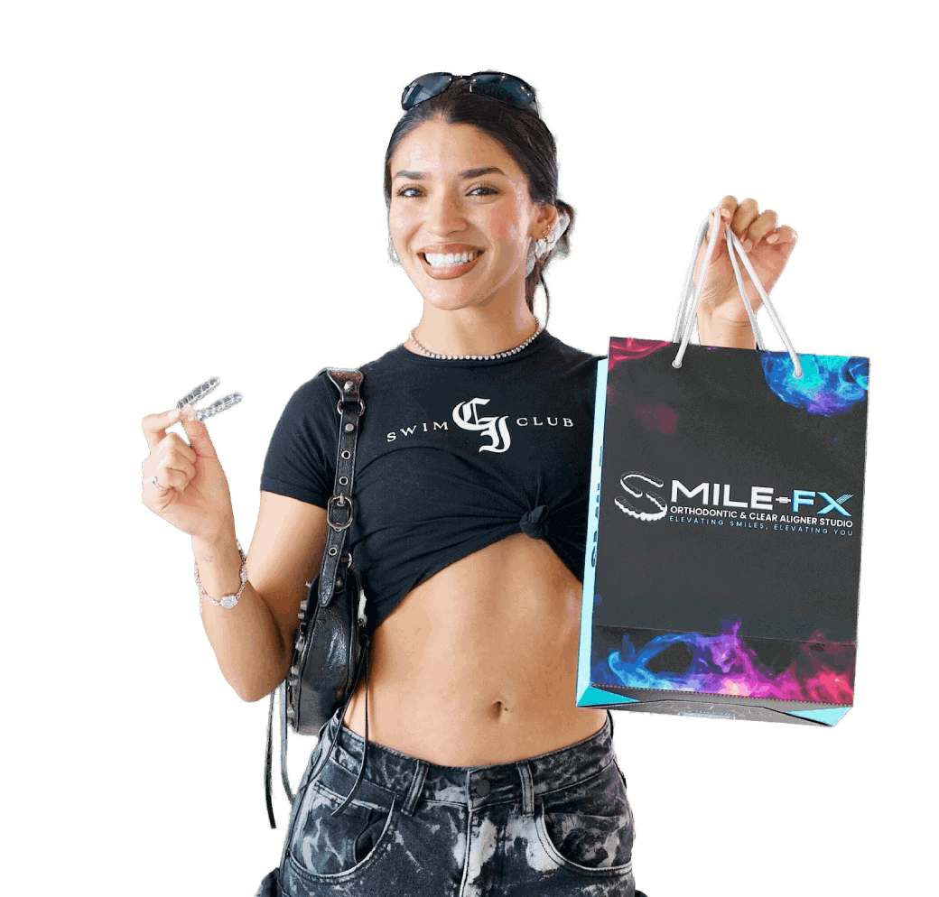 Smiling woman holding orthodontic tools and a SMILE-FX bag.